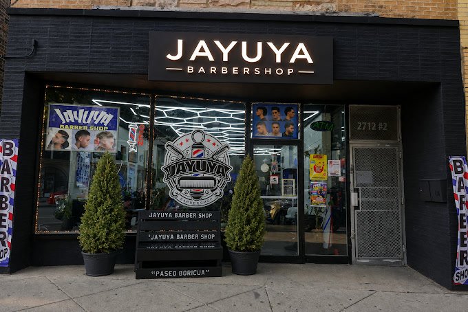The Jayuya Barbershop storefront on Division Street